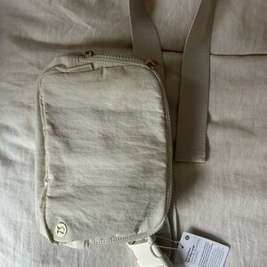 Lululemon Beige Crossbody Bag with Adjustable Strap